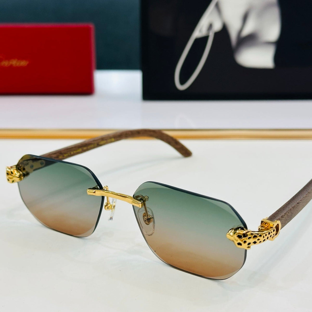 CARTIER PANTHÈRE RIMLESS OVAL FRAME SUNGLASSES  543637 IN METAL