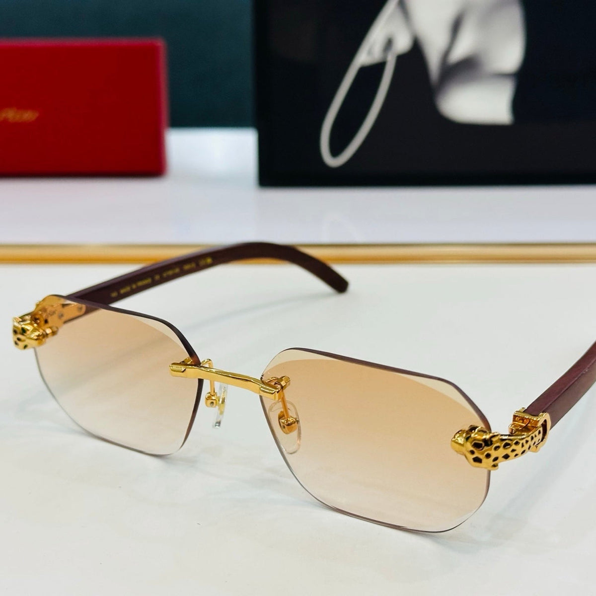 CARTIER PANTHÈRE RIMLESS OVAL FRAME SUNGLASSES  543637 IN METAL