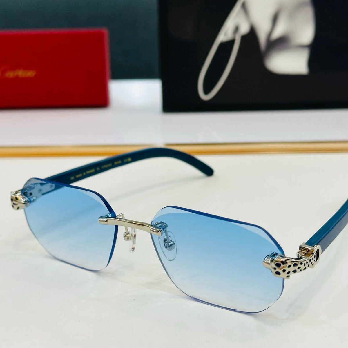CARTIER PANTHÈRE RIMLESS OVAL FRAME SUNGLASSES  543637 IN METAL