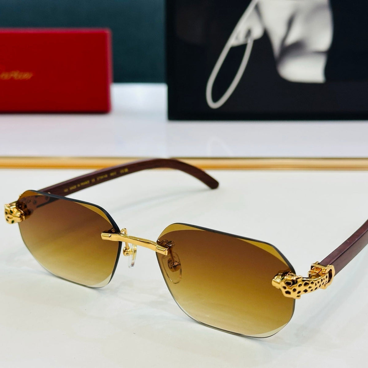CARTIER PANTHÈRE RIMLESS OVAL FRAME SUNGLASSES  543637 IN METAL
