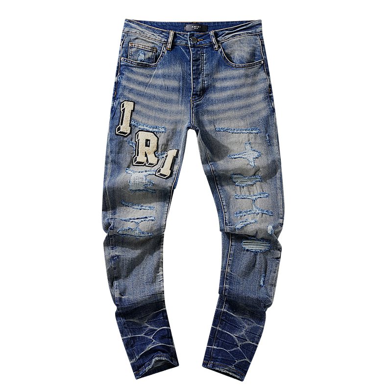 Amiri Varsity Letter Patch Distressed Jeans